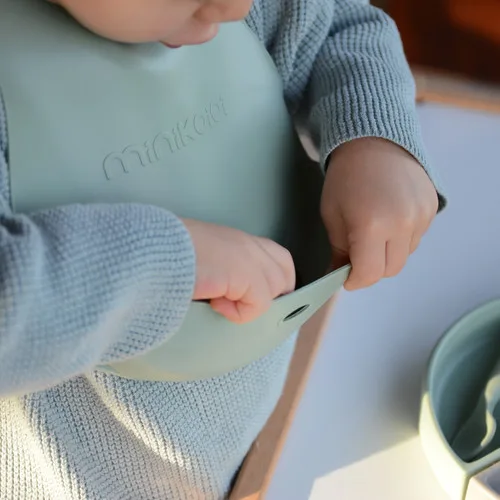 MINIKOIOI FLEXI BIB BAVOIR EN SILICONE 6M+
